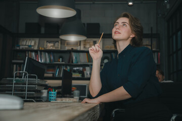 Businesswoman working overtime in the office concept. Successful trade business training and thinking affairs while working in office late at night