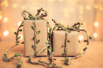 gift box, present on the table and light of bokeh background. Valentine's Day, Christmas, Birth...