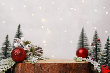 Christmas background with wooden podium for presentation of the product and christmas decorations. The pedestal is made of natural wood