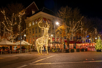 City scenic from Deventer at night in christmas time in the Netherlands