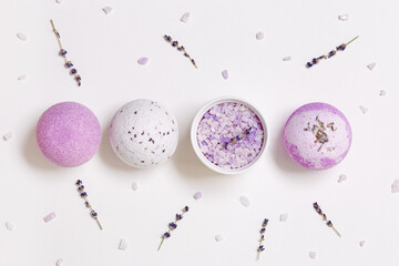 Natural bath bombs and sea salt with lavender essential oil, spa products with dry herbal ingredients. Natural cosmetic for beauty treatment and body care, herbal medicine