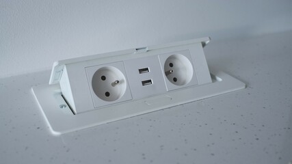 Retractable Pop Up Power Outlet Installed on Kitchen Counter	