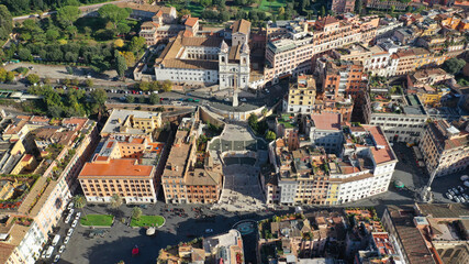 Obraz premium Aerial drone photo of iconic Piazza di Spagna and beautiful baroque stairway a popular meeting place, Rome, Italy