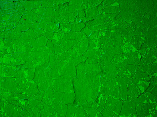 Abstract texture from old green cracked paint on the wall.