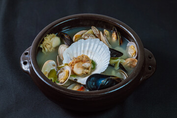 Jogae tang, Korean style clam soup : Soup with clams in their shells and vegetables in a clam...