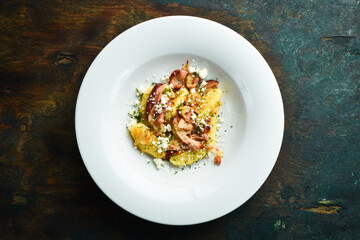 Potato gnocchi with bacon and cheese. Restaurant menu. Top view.
