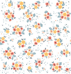 Beautiful floral pattern in small abstract flowers. Small colorful flowers. White background. Ditsy print. Floral seamless background. The elegant the template for fashion prints. Stock pattern.