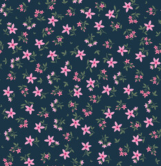 Vector seamless pattern. Pretty pattern in small flowers. Small pink flowers. Navy Blue background. Ditsy floral background. The elegant the template for fashion prints. Stock.