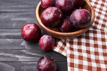 plums fruits natural products on a wooden table top view