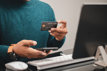 Businessman planning career investment Loan and home ideas are approved with credit card limits.