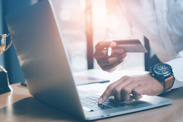 Investment planning business with a laptop Loans are approved for credit card limits.
