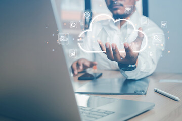 Businessman working through laptop showing online business data in income data format for business technology analysis. cloud business development concept
