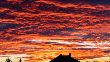 Colorful cloudy sky at sunset. Dramatic sunset sky with clouds. Sky texture, nature background.