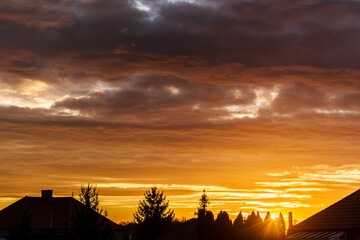 Colorful cloudy sky at sunset. Dramatic sunset sky with clouds. Sky texture, nature background.