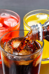 Pouring cola drink drinks lemonade softdrinks in a glass portrait format