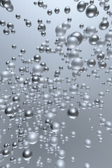 3D flying silver bubbles, spheres, balls. Minimal composition for creative design, poster, greeting card. Festive vertical template