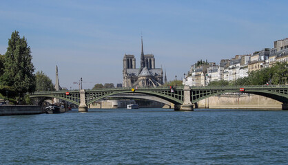 Obraz premium A boat ride on the river Seine and enjoying the beauty of Paris - France 