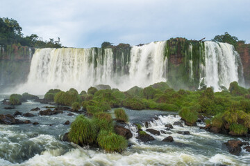 Beautiful view of a large waterfall at Iguazu Falls from brazilian side, one of the Seven Natural Wonders of the World - Foz do Iguaçu, Brazil