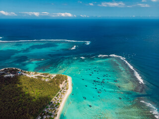 Fototapeta na wymiar Coastline of Tropical Mauritius with blue ocean. Aerial view