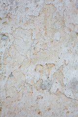 Old whitewashed wall with rich texture