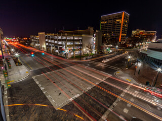 Busy intersection in downtown Boise with streaking car lights