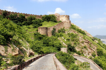 Fototapeta na wymiar Serpentine road and wall Madhvendra palace, Nahargarh fort. Jaipur, India 