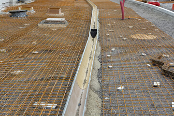 preparatory works for concreting, placing the reinforcing mesh on construction site