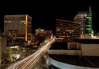 Fototapeta na wymiar Night skyline of Boise with streaking car lights