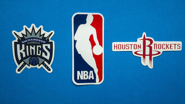 October 1, 2021, Springfield, USA, Emblems Of The Houston Rockets And Sacramento Kings Basketball Teams On A Blue Background.