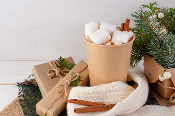 Obraz na płótnie Canvas Christmas composition, cocoa with marshmallows on a white background, copy space