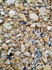 Top down view of yellow pebble on the Black sea coast
