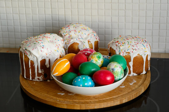 Springtime. Festive Composition In Rustic Style. Easter Cake And Painted Eggs On Wooden Table. Copy Space. 45 Degree Angle View