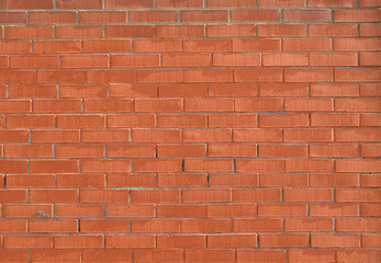 Obraz premium Background. New Red Brick Wall closeup.