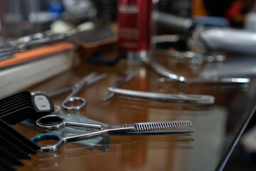 Fototapeta na wymiar Close-up of hairdressing elements. Blurred background.