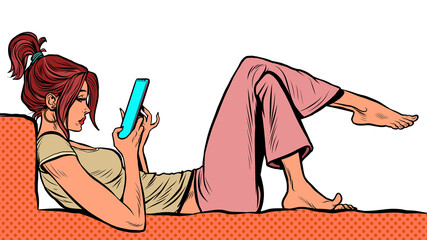 a young woman lies and watches a smartphone, the Internet and online social networks - 473196120