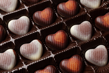 Box with heart shaped chocolate