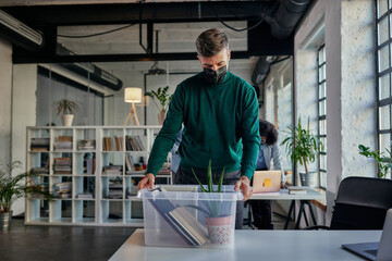 Man return to work and setting office table
