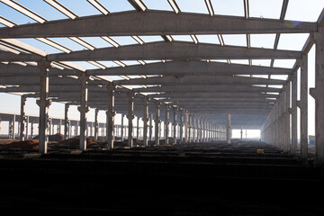 sunlight seeping through the newly built factory concrete