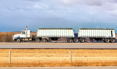 Heavy Cargo on the Road. A truck hauling freight along a highway