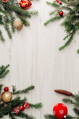 Christmas Composition on a White Wooden Table with Copy Space