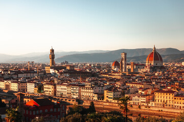 Fototapeta na wymiar High panorama above Firenze with the Arno river in the Tuscany, Italy.