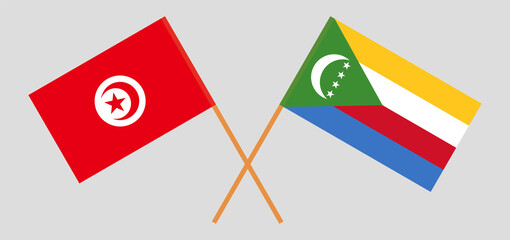 Crossed flags of Tunisia and the Comoros. Official colors. Correct proportion