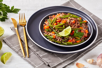 fried brown rice with green beans and carrot