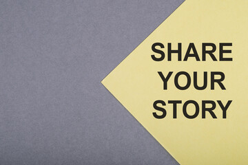 SHARE YOUR STORY - text on gray-yellow background.