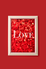 Valentine's Day frame with red heart and lettering Love
