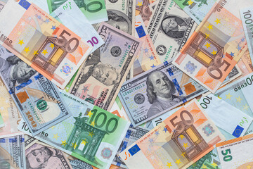 Obraz na płótnie Canvas Closeup of dollar and euro banknotes