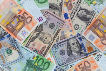 Obraz na płótnie Canvas Closeup of dollar and euro banknotes