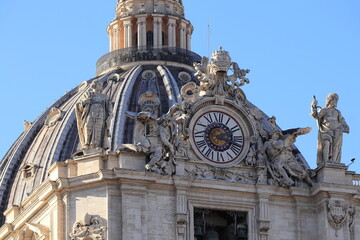 St Peter's Basilica Exterior Close Up with Sculptures, Clock and Dome in Rome, Italy