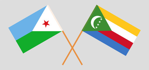 Crossed flags of Djibouti and the Comoros. Official colors. Correct proportion