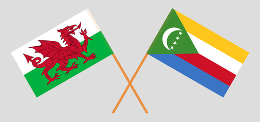 Crossed flags of Wales and the Comoros. Official colors. Correct proportion